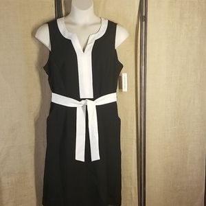 New w/tags classy black dress with white detail